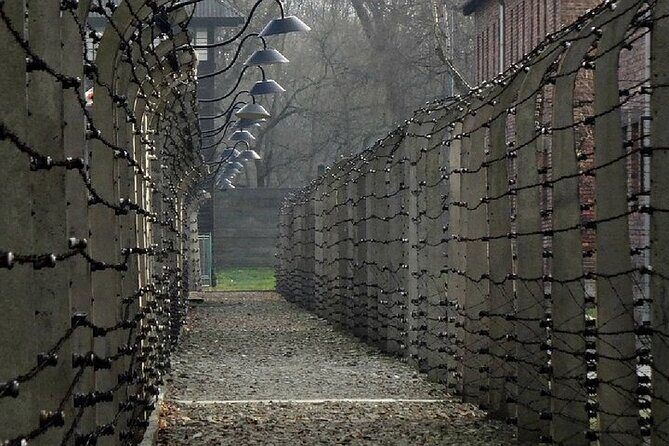 Auschwitz Birkenau Transfer and Guide with Salt Mine Combo Option - Auschwitz I: Former Prison Blocks, Guided Context, and Headsets