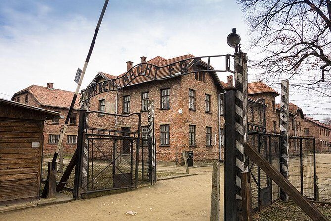 Krakow: Auschwitz-Birkenau & Salt Mine OneDay Tour (hotel pickup) - Getting into Auschwitz: security first, then your guide and headsets